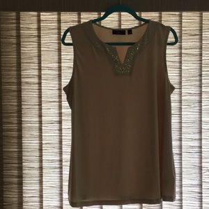 Two piece top with studded neckline. Sheer fabric